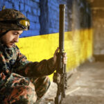 Military,Soldier,On,The,Background,Of,The,Flag,Of,Ukraine.